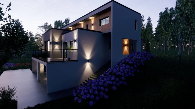 Maison contemporaine éclairée à la tombée de la nuit