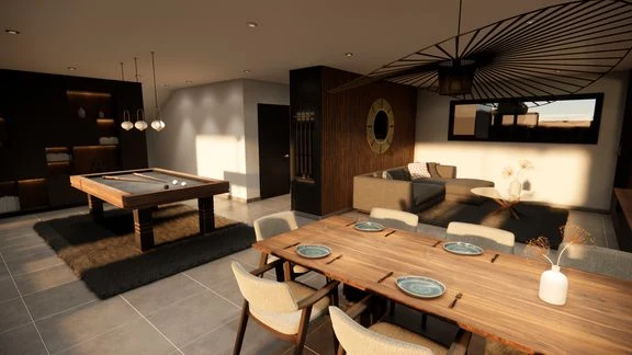 Vue d’un espace intérieur avec cuisine, salle à manger et salon ouverts
