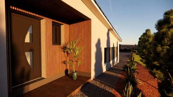 Vue d’une maison aux façades claires, avec toiture sombre, accès et terrasse