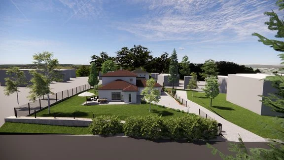 Maison à toiture en tuiles, garage et jardin, vue depuis ses abords