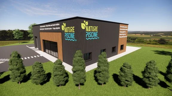 Bâtiment professionnel à bardage sombre et bois, avec accès et stationnement