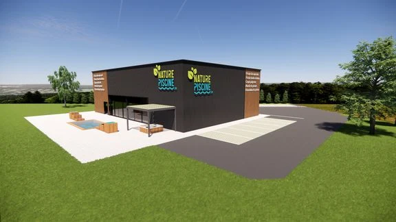 Bâtiment professionnel à bardage sombre et bois, avec accès et stationnement